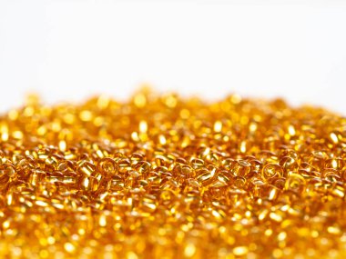 Minik altın boncuklu arka plan, parlak, ışıltılı
