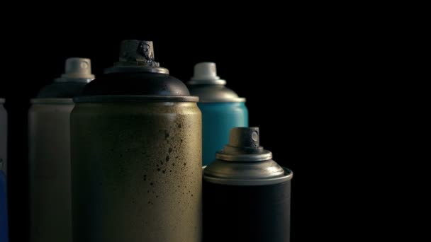 Passing Grungy Used Spraypaint Cans — Stock Video