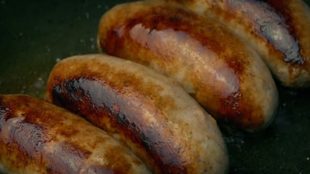 Pork Sausages Frying Closeup — Stock Video