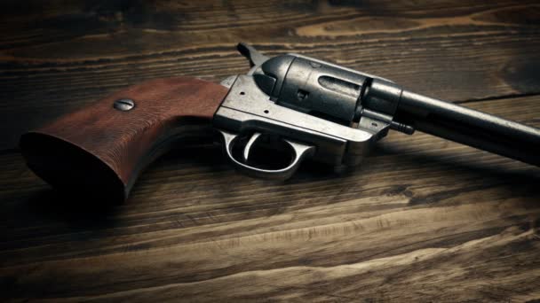 Passing Six Shooter Gun Table — Stock Video