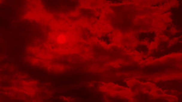 Ciel rouge apocalyptique avec soleil derrière les nuages 