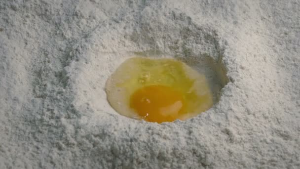 Egg Breaks Flour — Stock Video