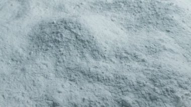 Atış hareketli toz malzeme yığını