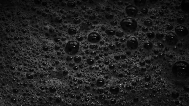 Black Foam Bubbles Popping — стоковое видео