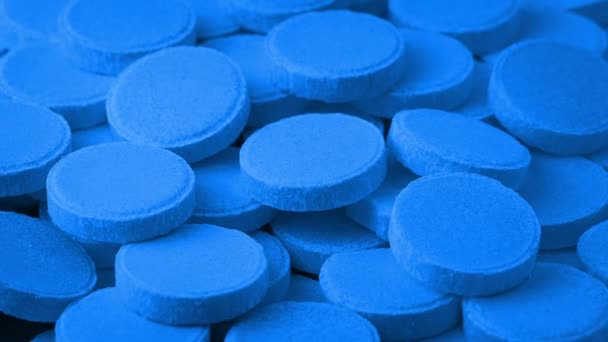 Montón Tabletas Médicas Azules Girando — Vídeos de Stock