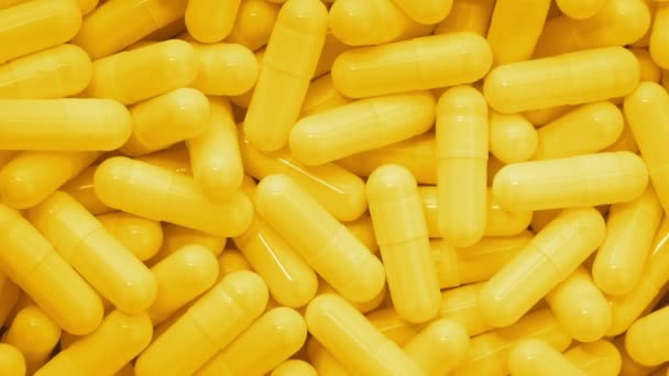 Yellow Supplement Capsules Rotating — 비디오