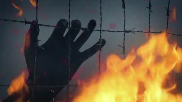 毒性のあるウォーゾーンで火災とフェンスに手 — ストック動画