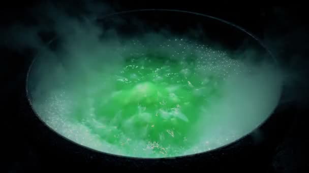 Smoke Rises Spooky Green Boiling Cauldron — Stock Video