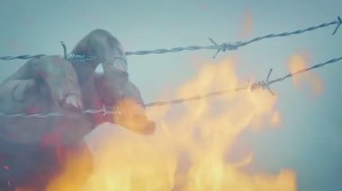 Askerin eli dikenli tele takıldı Duman ve ateş içinde