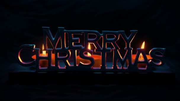Feliz Navidad Encendida Con Velas Oscuridad — Vídeos de Stock