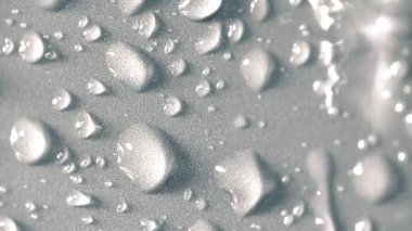 White Surface In Rain Close-Up