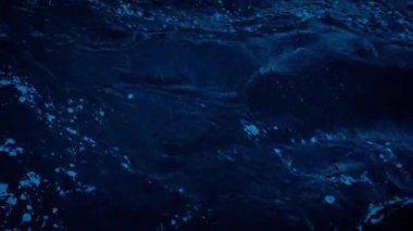 River Surface Flowing In The Dark