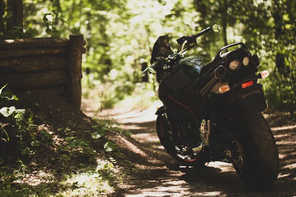 Moto Preto Esportes Contexto Uma Parede Cinza Subterrânea Estúdio — Fotografia de Stock