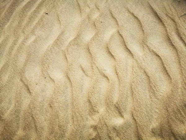 Přírodní pouštní písek vítr foukal terén pozadí — Stock fotografie