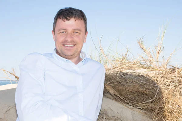 Friendly Handsome Man Sit Sand Dunes Summer Vacation Day — Stock Photo, Image