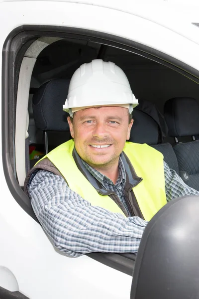 handsome man car driver in van at construction site like engineer architect