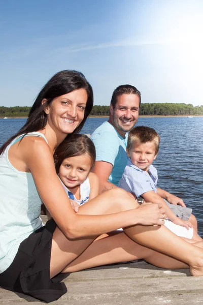 Happy Young Family Four Beach Pontoon — Stock Photo, Image