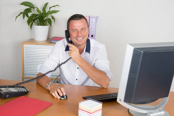 Home office businessman talking on phone