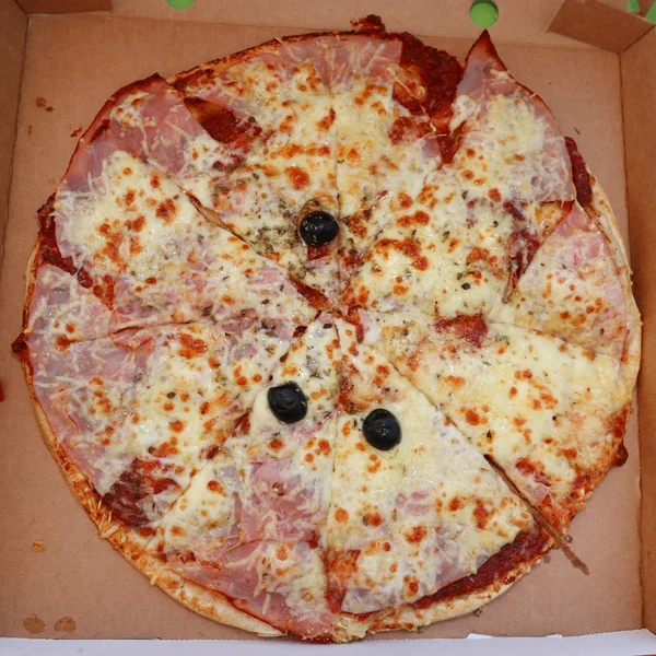 pizza margherita in its box delivery box