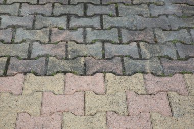 difference between clean driveway autoblocking slabs and dirty after a high pressure jet clipart