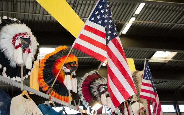 Indian chief headdresses and American flags