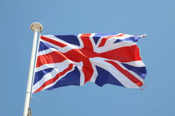 Verenigd Koninkrijk British Vlag Een Mat Wind Blauwe Hemel Stockfoto