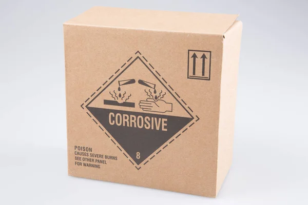 cardboard box with corrosive danger logo product