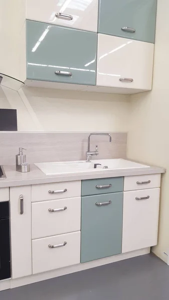 modern white and blue kitchen with a retro old look