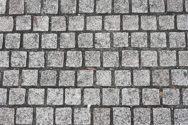 通りの石畳で構成される背景 — ストック写真