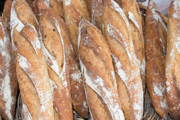 法国面包棒新鲜的烤箱上壁纸背景 — 图库照片