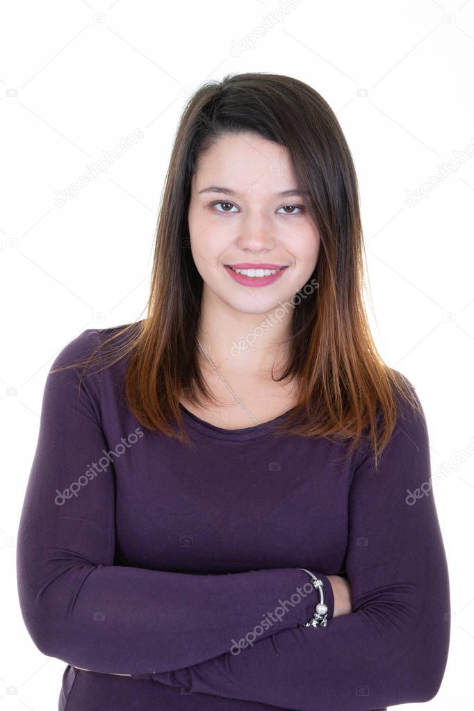 Confident pretty woman with white smile standing with folded arms