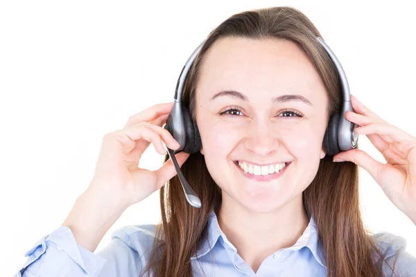 Consultant of call center woman in headphones confident and happy with a big natural smile laughing