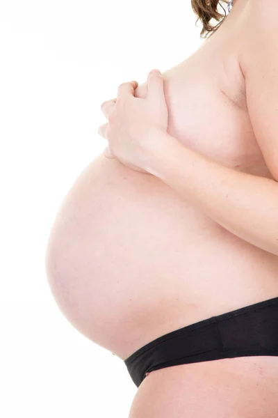 孕妇手在乳房和胸部在白色背景 — 图库照片