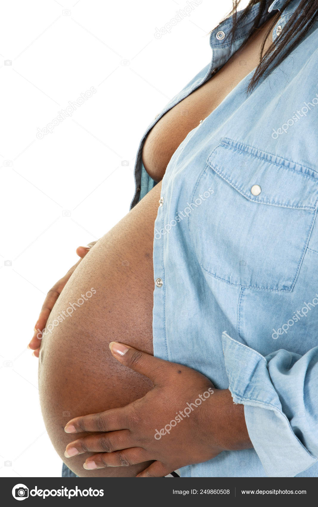 Young Pregnant Black Woman Touching Her Belly Stock Photo by ©OceanProd  249860508