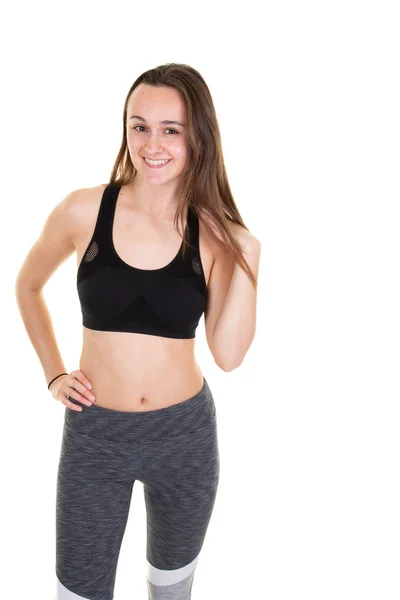 Attraktive Junge Erwachsene Frau Sportbekleidung Posiert Auf Weißem Hintergrund — Stockfoto