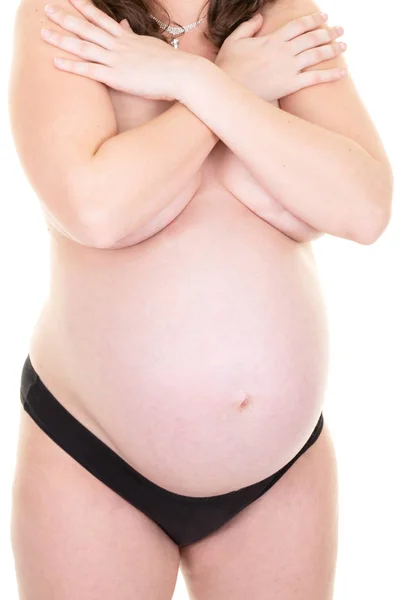 乳の胸に妊娠中の女性トップレス シャートレス腕 — ストック写真