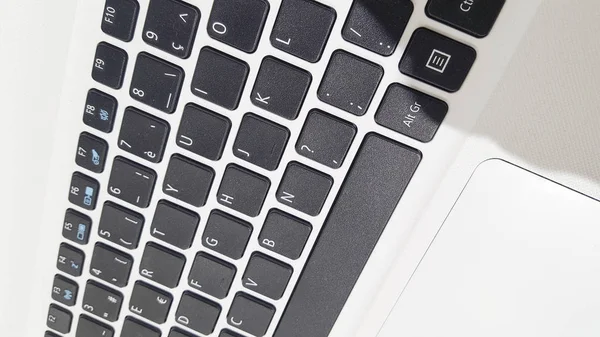 ノート パソコンのキーボードのクローズ アップの背景ビュー — ストック写真