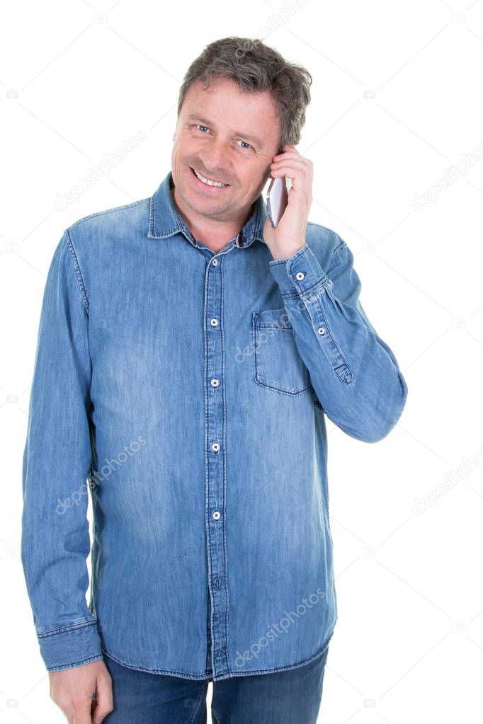 Handsome mature man with mobile phone in white background