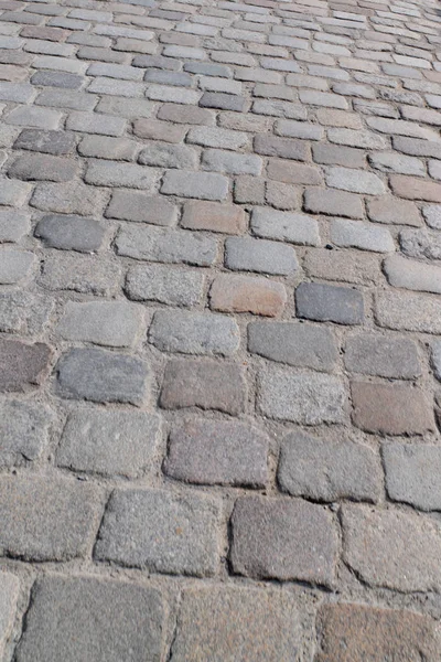 Granit Kullerstensbelagd Trottoar Bakgrund Stengatan — Stockfoto