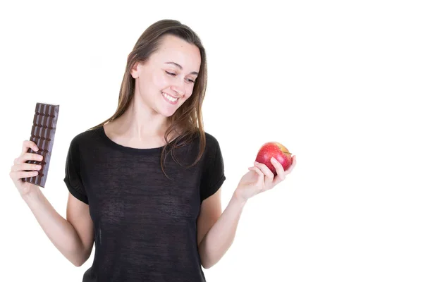 Young Woman Choosing Red Apple Chocolate Bar Isolated White Background — ストック写真