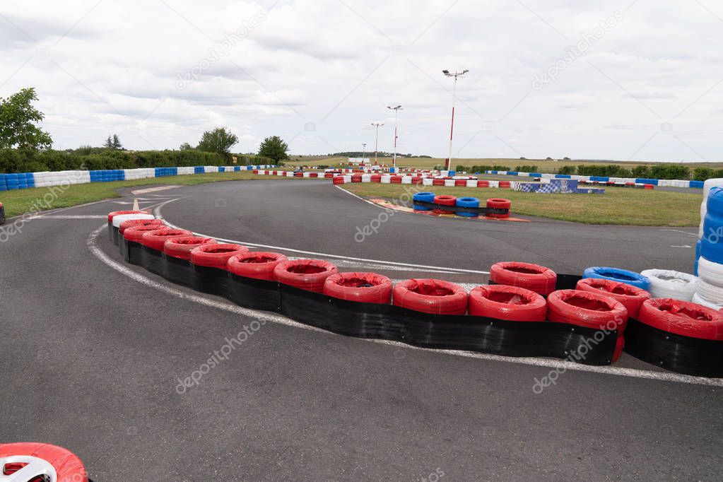 Race track go kart barrier made with old tires for safety concept