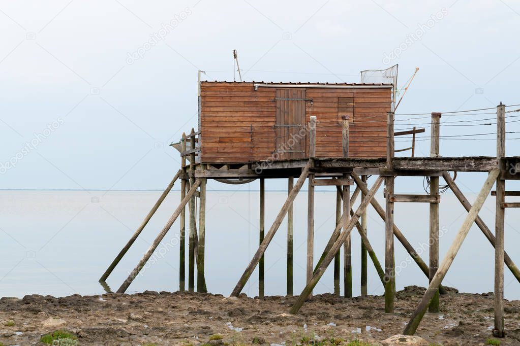 wooden fishing huts on the Atlantic coast of Charente in France at Fouras