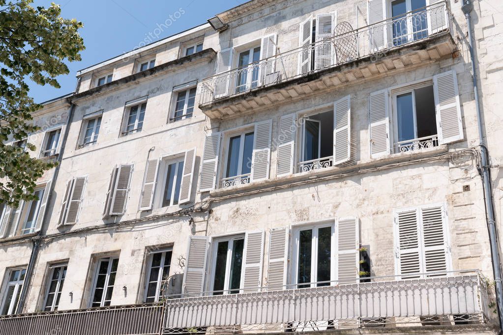 building in city center of La Rochelle in France with balcony