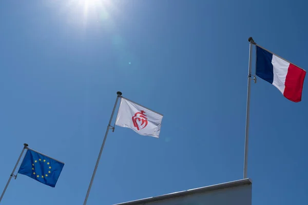 floating flag white red flag of Vendee France EU European Union Europe in blue sky in sunny day
