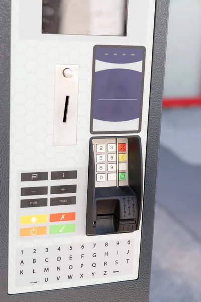 coin operated ticket machine pay station for roadside parking ticket in street