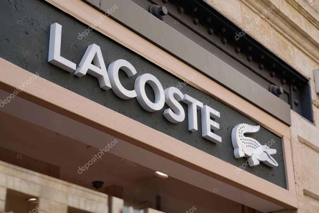 Bordeaux , Aquitaine / France - 09 18 2019 : Lacoste board sign French fashion company founded in 1933