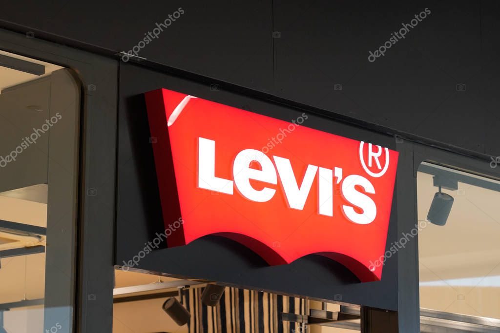 Bordeaux , Aquitaine / France - 09 24 2019 : Levi's Jeans Sign and Logo levis store window