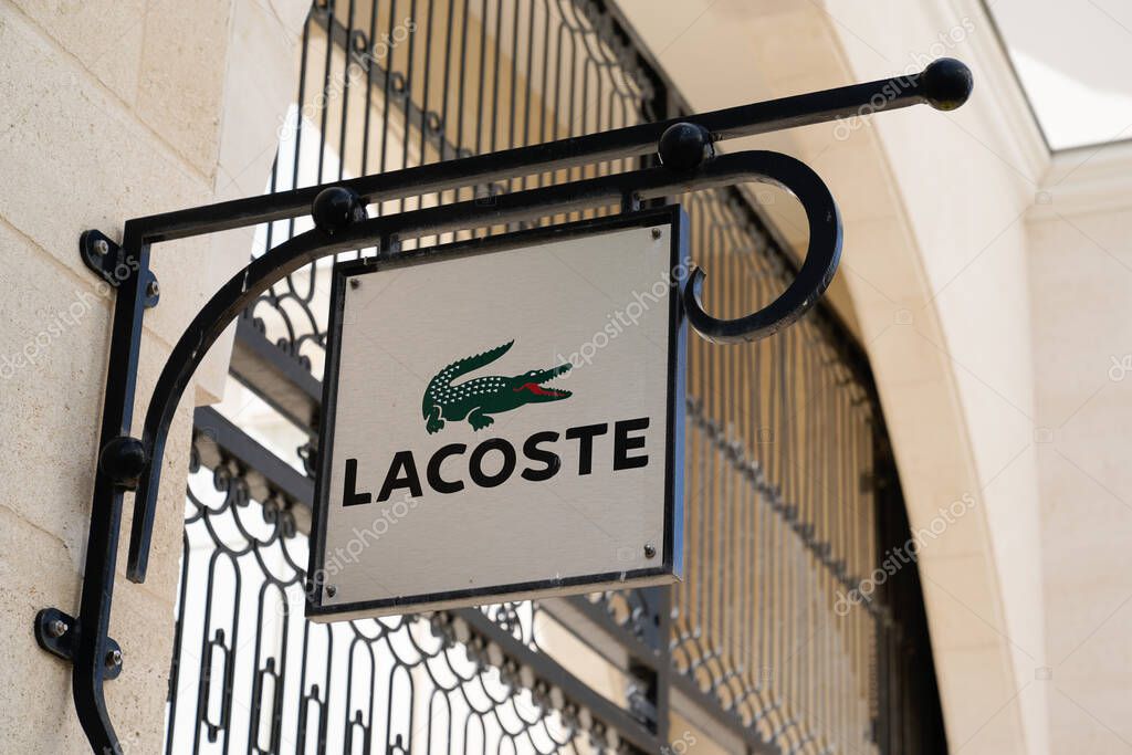 Arcachon , Aquitaine / France - 10 08 2019 : Lacoste store logo French fashion company shop