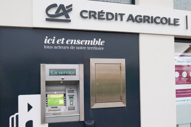 Bordeaux, Aquitaine / France - 08 16 2020: Kredi Agricole logo ca text on bank Agency on ATM sign on front office