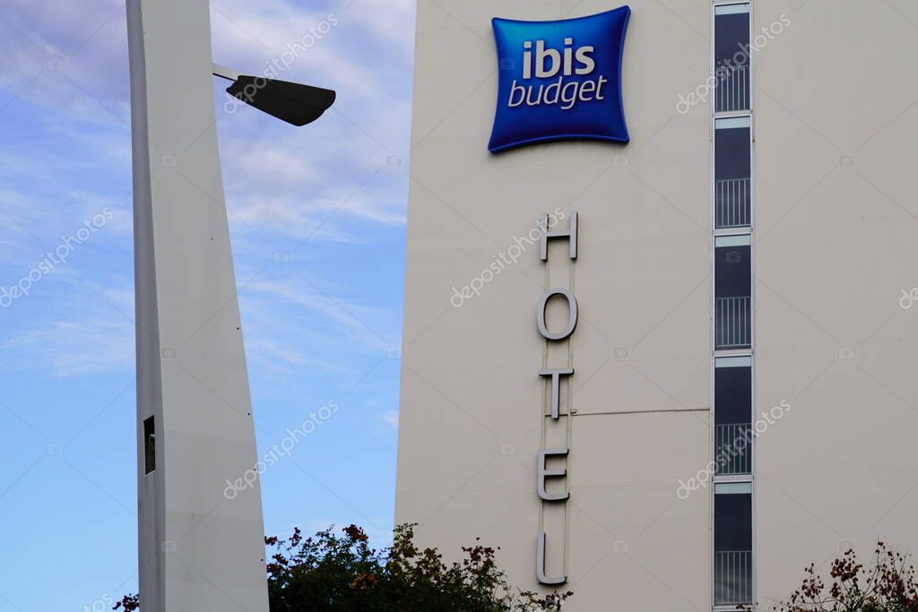 Bordeaux , Aquitaine / France - 08 16 2020 : ibis budget sign text and logo blue cushion front of hotel  building